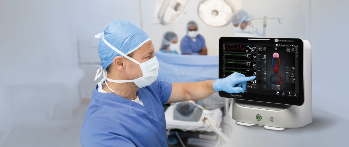 Surgeon in OR using Hemosphere Alta monitor