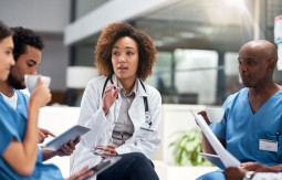 Doctor talking with nurses